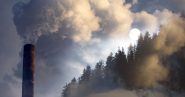 pollution streaming out of smoke stacks